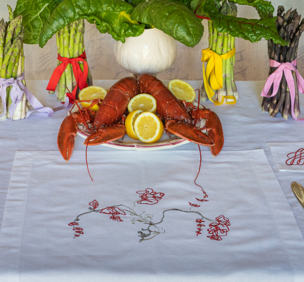 Embroidered luxury napkins designed by Giles Deacon